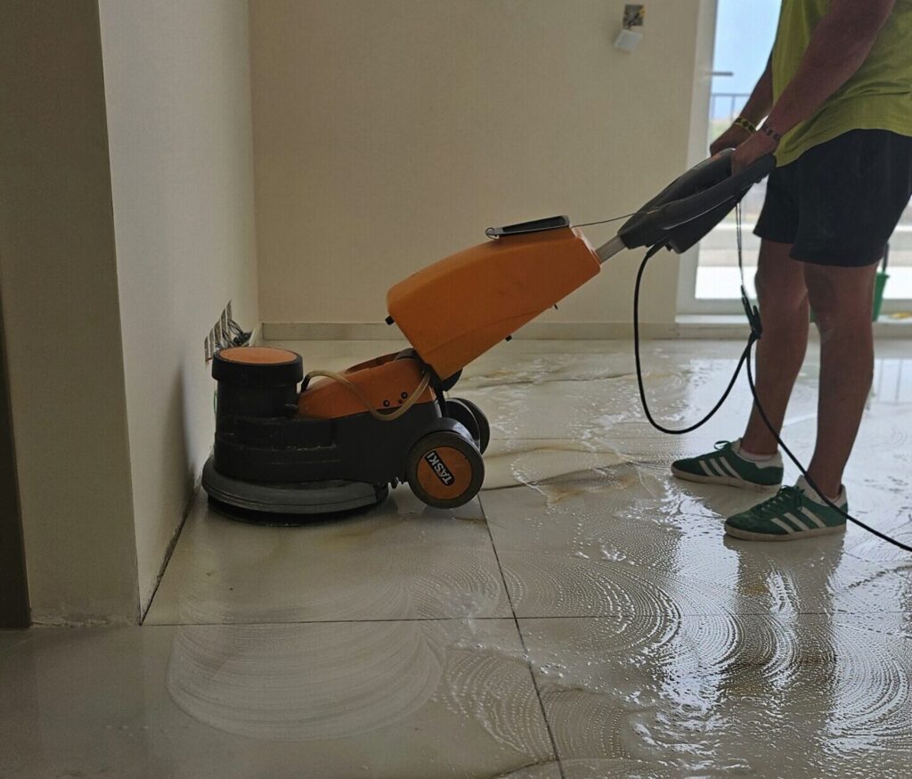 Post construction cleaning machine in operation